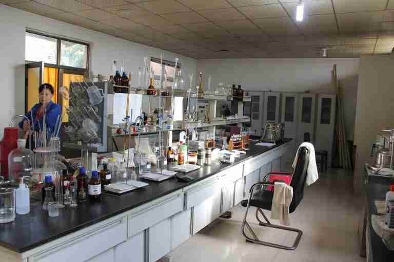 Synthesis bench with glassware in the Green Agrochem laboratory