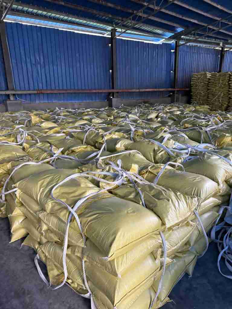 Rows of lignosulfonate bags in the warehouse