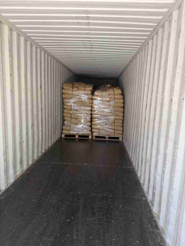 Palletized lignosulfonate cargo in a container